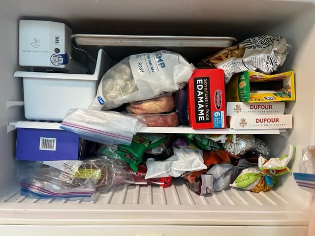 A jam-packed freezer compartment.